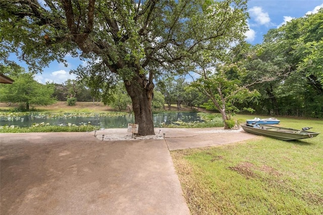 view of yard with a water view