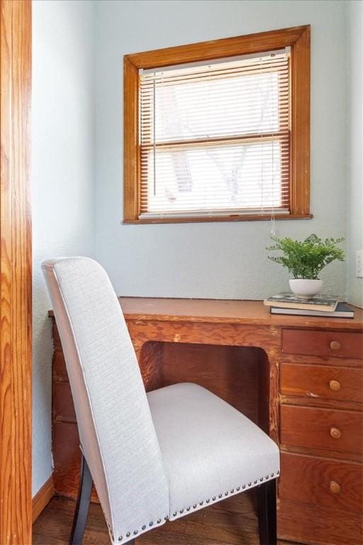 office with a healthy amount of sunlight and baseboards