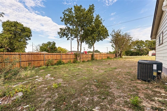 view of yard featuring central AC unit