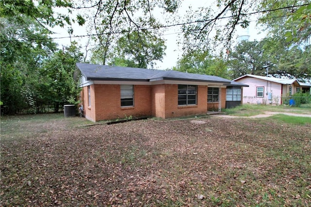 view of front of house featuring central AC unit