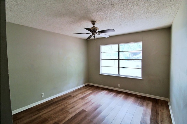 unfurnished room featuring ceiling fan, wood-type flooring, and a textured ceiling