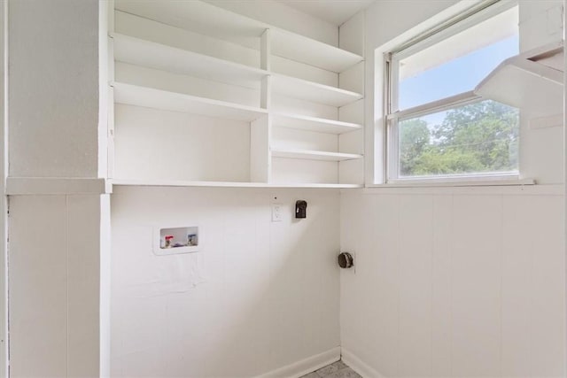 laundry area with washer hookup and electric dryer hookup