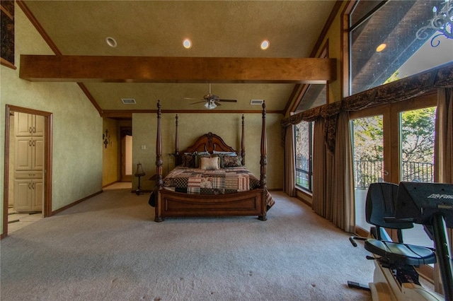 carpeted bedroom featuring vaulted ceiling with beams and access to outside