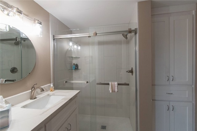 bathroom featuring vanity and walk in shower