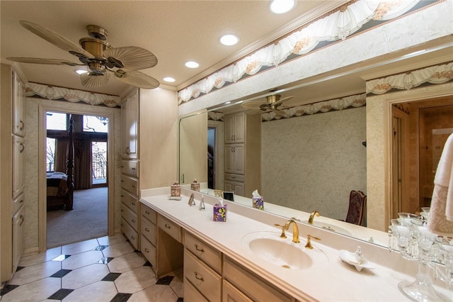 bathroom featuring vanity and ornamental molding