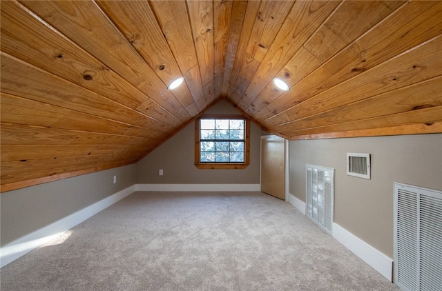 additional living space with carpet, wooden ceiling, and lofted ceiling