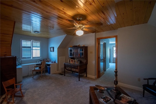 home office with ceiling fan and carpet floors