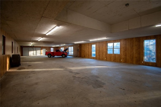 garage with wood walls