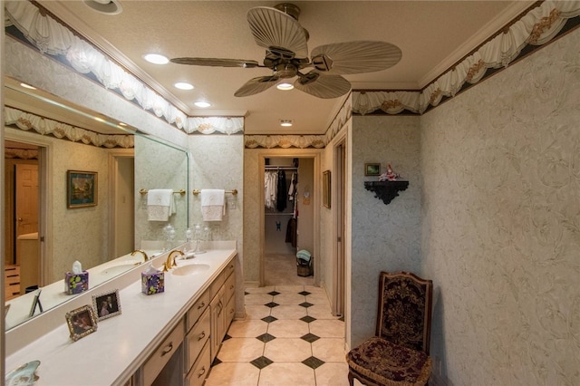 bathroom featuring vanity, ceiling fan, and crown molding