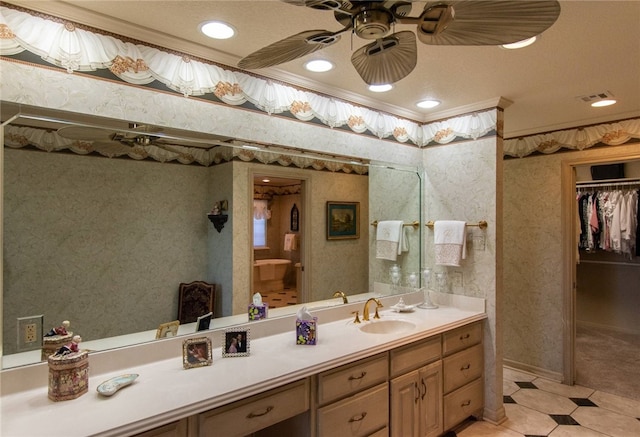 bathroom with vanity, ceiling fan, and ornamental molding