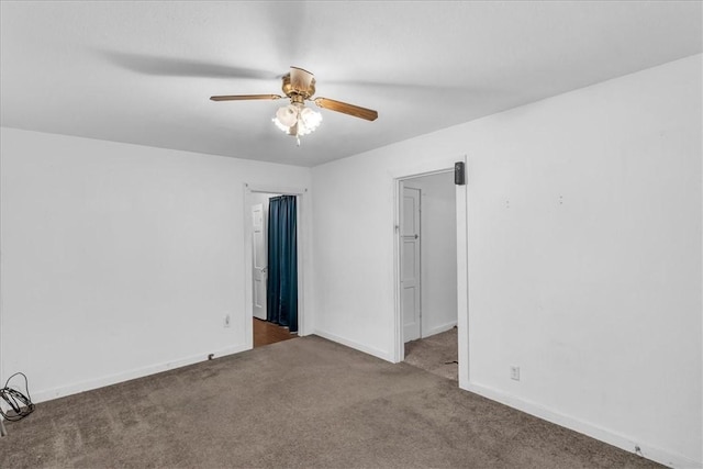 carpeted empty room with ceiling fan