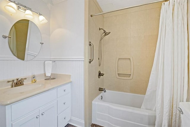 bathroom featuring vanity and shower / bath combination with curtain