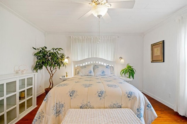 bedroom with ceiling fan, wood-type flooring, and ornamental molding