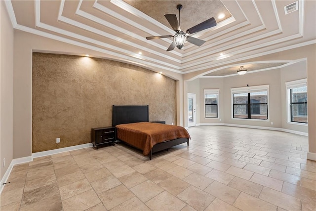 bedroom with a raised ceiling, ceiling fan, and crown molding