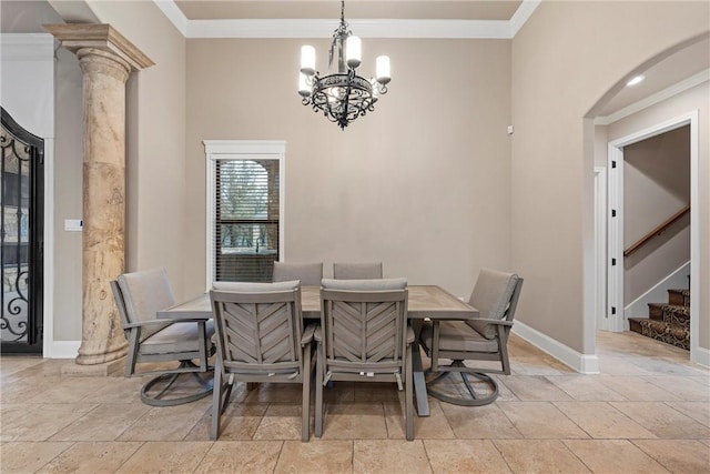 dining area featuring crown molding and an inviting chandelier