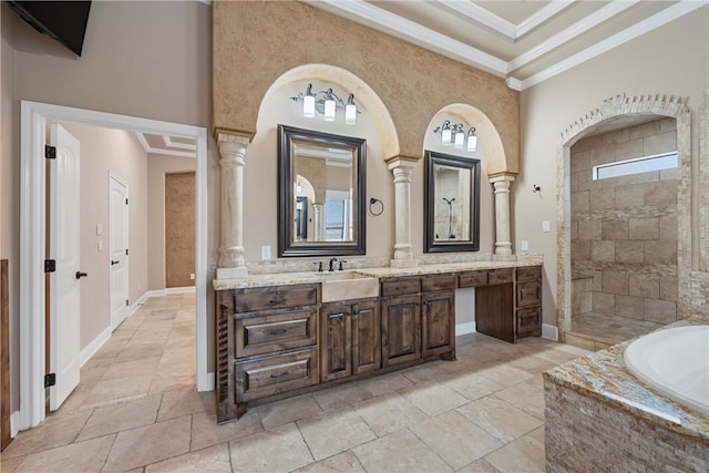 bathroom featuring vanity, ornamental molding, shower with separate bathtub, a towering ceiling, and decorative columns