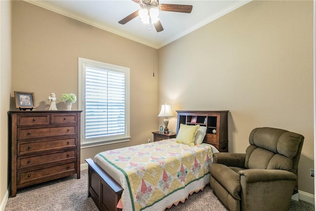 carpeted bedroom with ceiling fan and crown molding