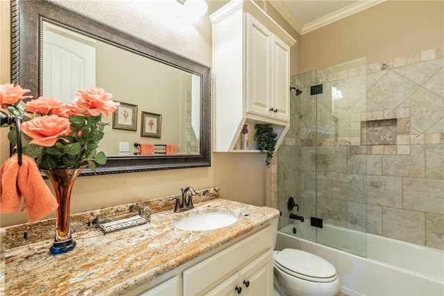 full bathroom with shower / bath combination with glass door, crown molding, vanity, and toilet