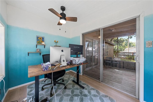 home office featuring ceiling fan and wood-type flooring