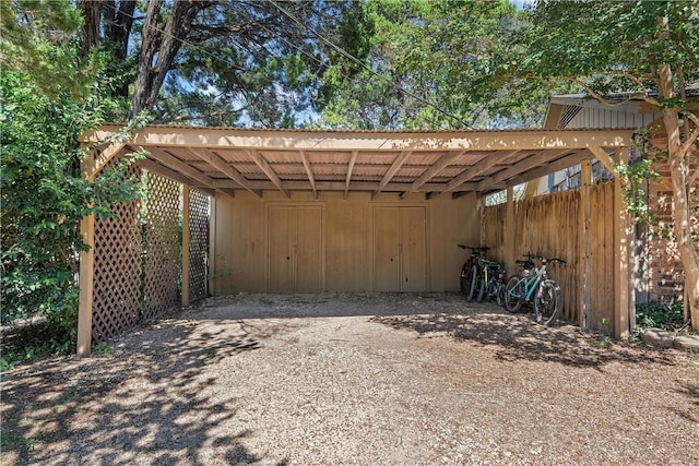 view of outdoor structure with a carport