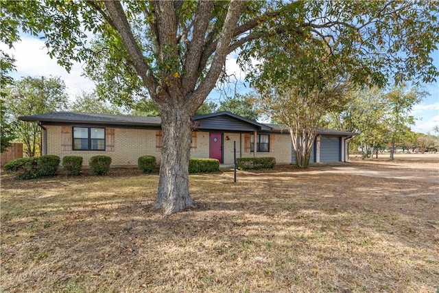 single story home with a garage