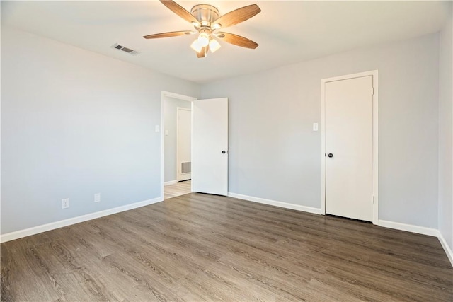 unfurnished room featuring ceiling fan and wood-type flooring