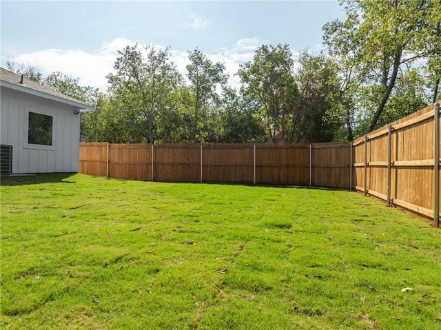 view of yard with central AC