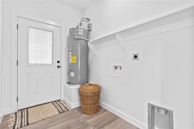 laundry room with electric water heater, hardwood / wood-style floors, washer hookup, and hookup for an electric dryer