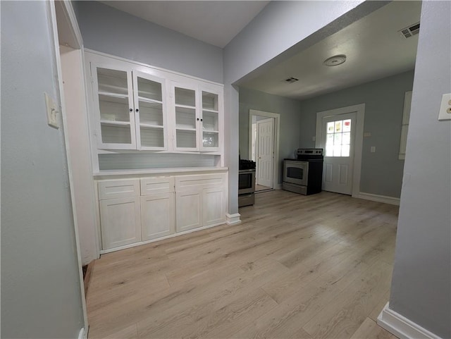 interior space with light hardwood / wood-style floors