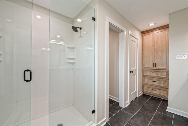 bathroom featuring tile patterned floors and walk in shower