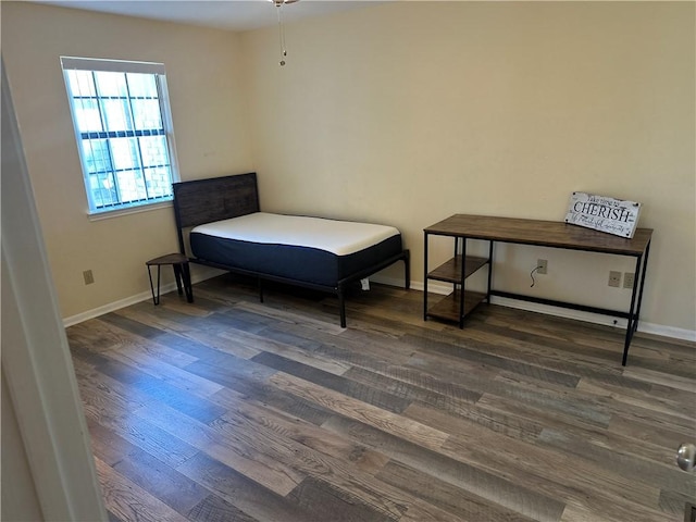 bedroom featuring dark hardwood / wood-style floors