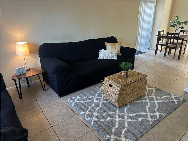 living room with light tile patterned floors