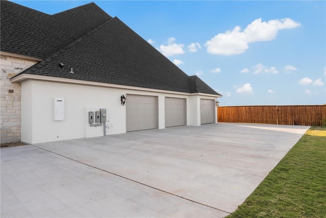 view of property exterior with a garage