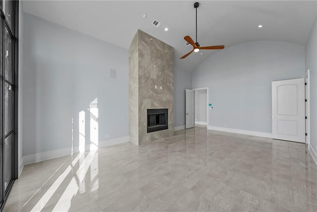 unfurnished living room featuring ceiling fan, a fireplace, and high vaulted ceiling