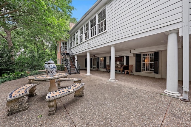 view of patio / terrace featuring ceiling fan