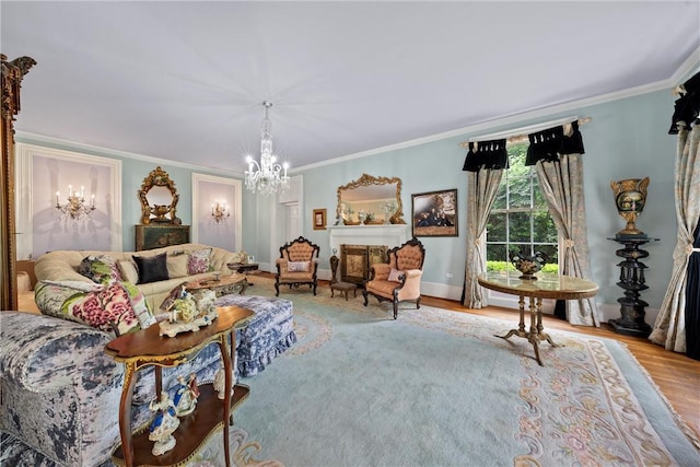 living room with crown molding, light hardwood / wood-style flooring, and a chandelier