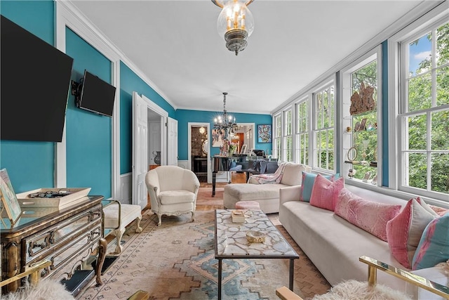 sunroom featuring a notable chandelier