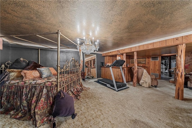 carpeted bedroom featuring a textured ceiling