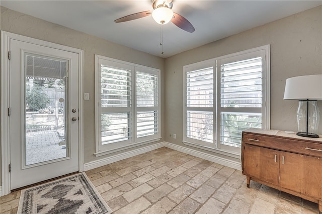 entryway with ceiling fan