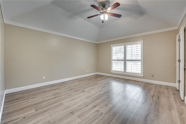 unfurnished room with vaulted ceiling, light hardwood / wood-style flooring, ceiling fan, and crown molding