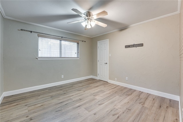 unfurnished room with crown molding, ceiling fan, and light wood-type flooring