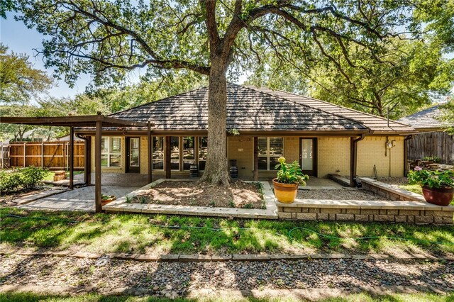 back of house featuring a patio area