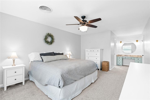 carpeted bedroom with ceiling fan