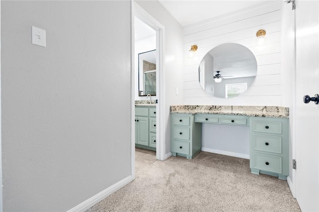 bathroom featuring vanity and ceiling fan