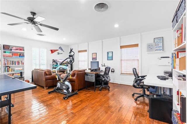 office area with ceiling fan and wood-type flooring