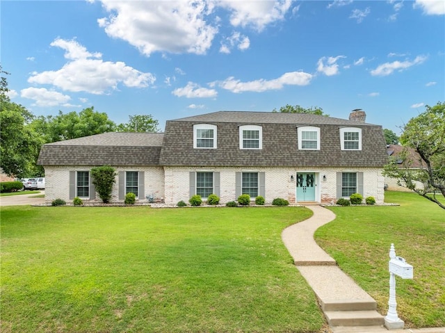 view of front of house with a front yard