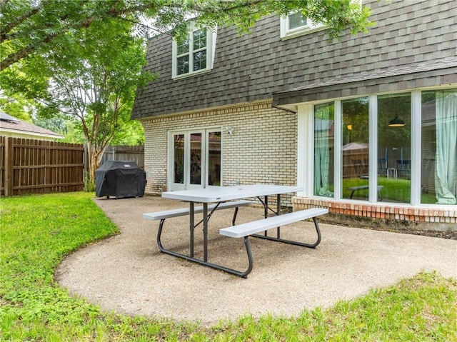 rear view of house featuring a patio area