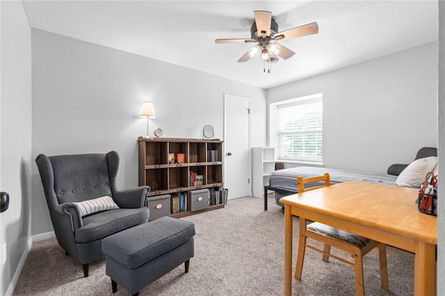 interior space featuring ceiling fan and carpet floors