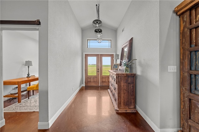 entryway with french doors and vaulted ceiling