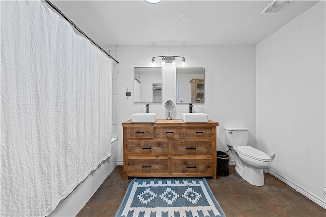 full bathroom featuring shower / bath combination with curtain, toilet, vanity, and concrete floors